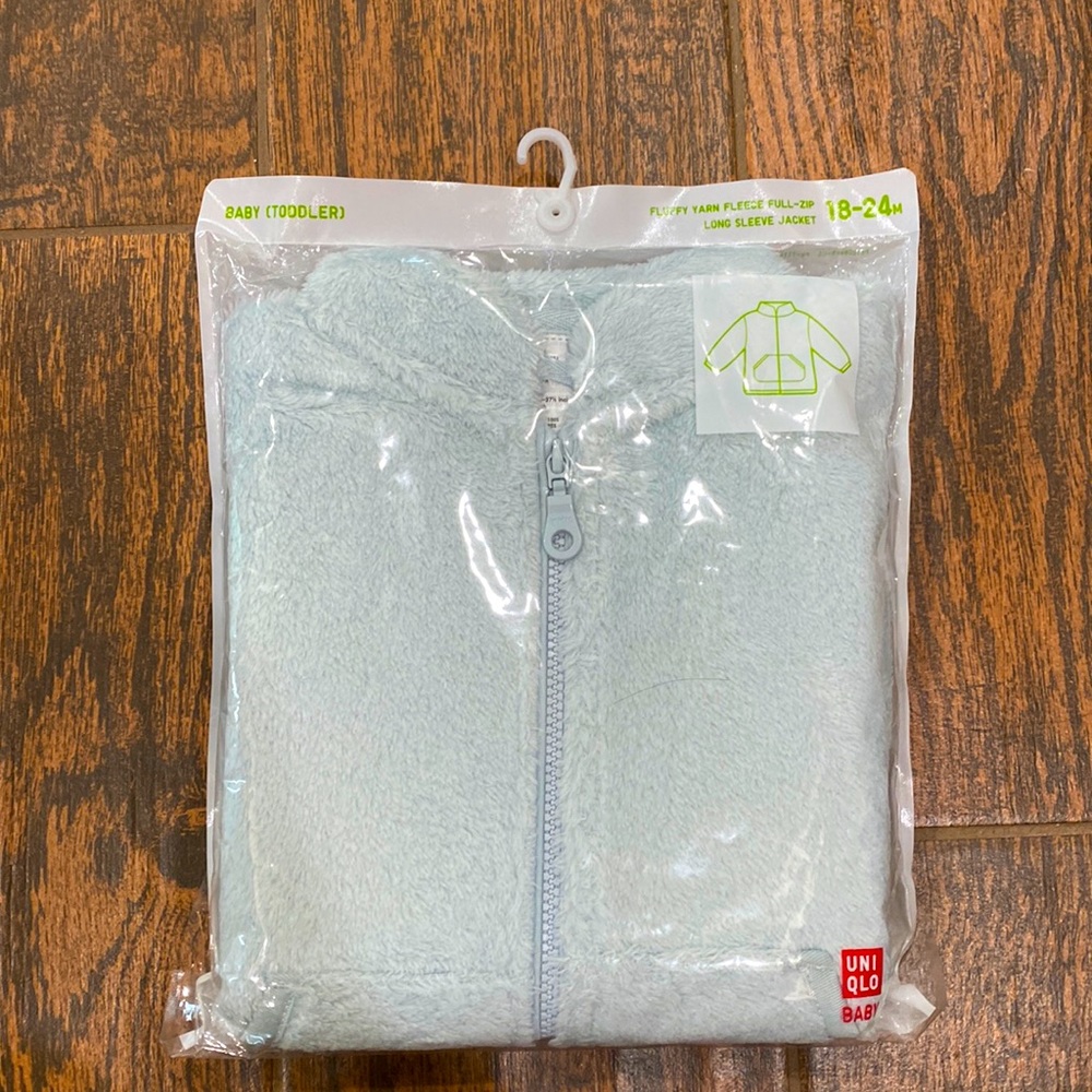 Uniqlo fleece baby jacket in light blue